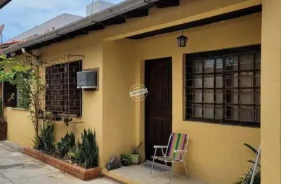 Casa em condomínio, com 2 dormitórios e garagem. cachoerinha- rs