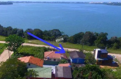Terreno bairro alto arroio de frente para a lagoa da ibiraquera, medindo 409m² em imbituba-sc