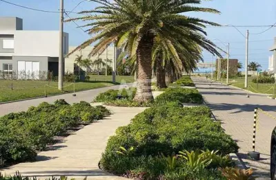 Terreno em condomínio fechado a poucos minutos da praia - capão da canoa!
