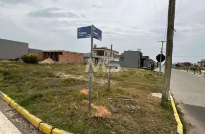 Terreno de esquina  à venda em Atlântida Sul, 300m², à 600m beira mar!
