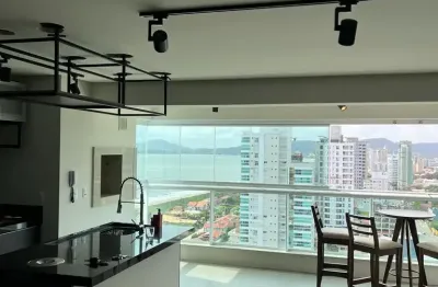 Mobiliado com vista mar definitiva - 2 suítes e 2 vagas de garage