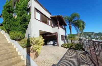 Casa com 3 dormitórios à venda, 234 m² por r$ 1.990.000,00 - panorâmico - garopaba/sc