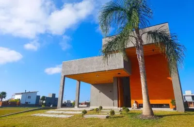 Casa com 3 dormitórios à venda, 189 m² por r$ 2.150.000,00 - praia do rosa - garopaba/sc
