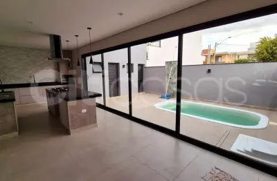 Casa com piscina em condomínio no residencial terras de são francisco