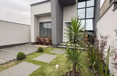 Casa moderna com suíte e amplo terreno no loteamento galápagos – tijucas