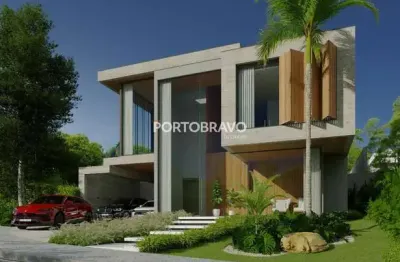 Casa de alto padrão à venda em Alphaville — 4 suítes, piscina aquecida