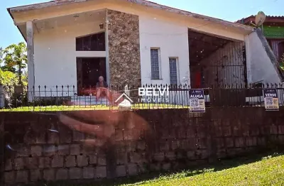 Casa 3 dormitórios com suíte, pátio amplo, localização no Lago Tarumã – Viamão