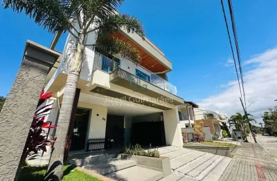 Sobrado de alto padrão em condomínio fechado à venda – 4 suítes e lazer completo, 232m² por r$ 2.800.000 - centro - balneário piçarras/sc