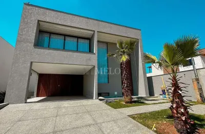 Espetacular casa com fachada imponente e piscina no condomínio gran park