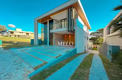 Espetacular casa com fachada imponente e piscina no condomínio alphaville vespasiano