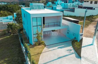 Belíssima casa a venda r$2.200.000,00 condomínio rosa dos ventos-vespaziano/mg