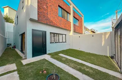 Belíssima casa geminada a venda no bairro trevo por r$990.000,00