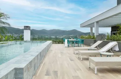 Apartamento com 2 dormitórios à venda, 66 m² por r$ 1.191.664,76 - cacupé - florianópolis/sc