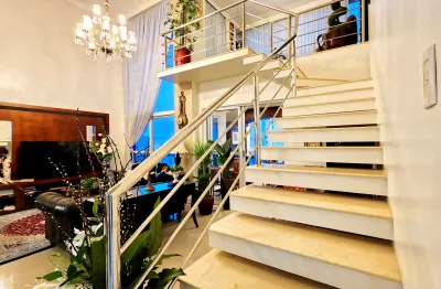 Apartamento mobiliado com pé direito duplo no Edifício Vermont, Centro de Balneário Camboriú SC.