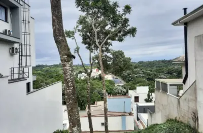 Terreno / lote à venda na rua das seringueiras no condomínio aruã ecopark lagos 2 em mogi das cruzes