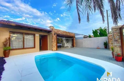 Casa com 3 suítes e anexo pertinho do mar no centro de xangri-lá