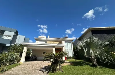 Sobrado 5 suítes decorado beira lago Condomínio Enseada Xangri-Lá