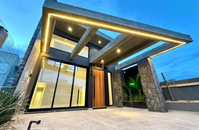 Casa beira mar com área gourmet superior zona norte capão da canoa