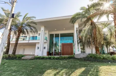 Casa 8 suítes com piscina de borda infinita no Condomínio Enseada Lagos em Xangr