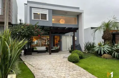 Sobrado mobiliado e decorado com piscina e 3 dormitórios em Xangri-lá