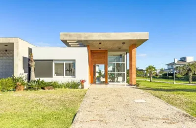 Casa mobiliada beira lago com piscina no condomínio Riviera em Xangri-lá RS