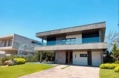 Sobrado mobiliado com piscina em condomínio a beira mar Xangri-lá RS