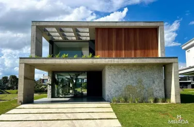 Sobrado beira lago com piscina no condomínio Celebration em Xangri-lá RS