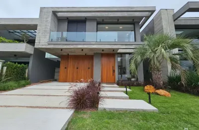 Sobrado mobiliado e decorado a beira lago no condomínio Sunset em Xangri-lá RS