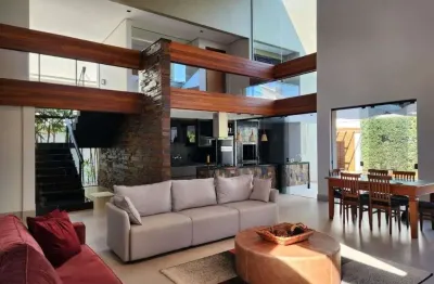 Casa com 4 dormitórios sendo 3 suítes à venda, 380 m² por r$ 3.995.000 - condomínio sun lake re