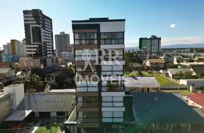 Apartamento, mobiliado, dois dormitórios sendo um suíte, centro de tramandaí