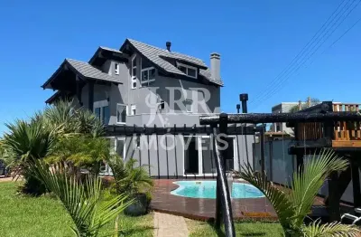 Casa em condomínio fechado com 3 quartos, na beira do rio, em imbé