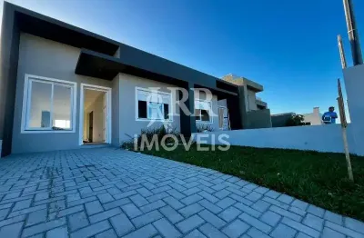 Geminado, dois dormitórios sendo um suíte, localizada em imbé