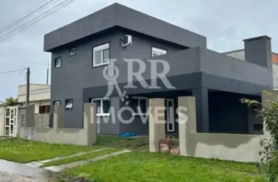 Imóvel de alvenaria, mobiliado, dois dormitórios sendo dois suíte, localizado em imbé