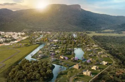 Terreno fundo lago no condomínio reserva da pedra - pedra branca