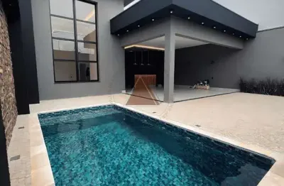 Casa à venda, com 3  suítes, ambientes integrados, móveis planejados e uma área de lazer com piscin