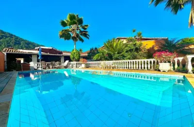 Casa com 4 quartos à venda na Avenida Humberto Pietro Peres, 65, Jardim Guaiuba, Guarujá