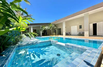 Casa com 6 suítes à venda, mobiliada e decorada, condomínio jardim acapulco guarujá.