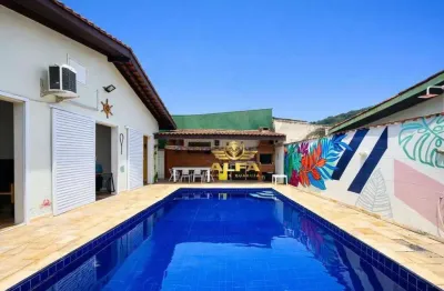 Casa com piscina e espaço gourmet no Condomínio Albamar, próximo à Praia do Pernambuco – Alfa Imóveis Guarujá