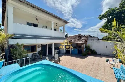 Casa ampla com piscina e área gourmet à venda na praia da enseada – alfa imóveis guarujá