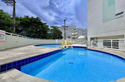 Apartamento reformado com sacada e lazer na Praia do Tombo – Alfa Imóveis Guarujá