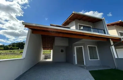 “sobrado de alto padrão no carijós — 136 m², 3 quartos e localização premium ao lado do centro'