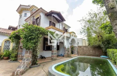 Casa de alto padrão à venda em Petrópolis, Porto Alegre – 3 quartos, piscina e varanda gourmet