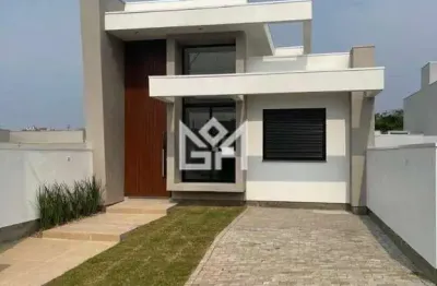 Casa à venda no bairro Reserva Bela Vista em Gravataí com suíte e churrasqueira