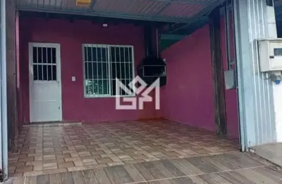 Casa Térrea com 2 Dormitórios e Garagem Fechada em Bairro Residencial Tranquilo