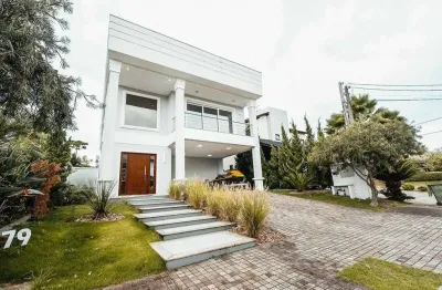 Casa de alto padrão à venda e locação no condomínio alphaville em gravataí