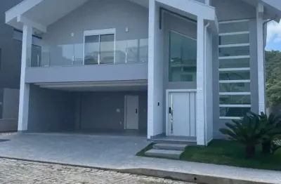 Magnífica casa de luxo no condomínio haras rio do ouro em balneário camboriú-sc: 5 quartos, 5 suítes, 2 salas, 6 banheiros, 3 vagas e 450m²!