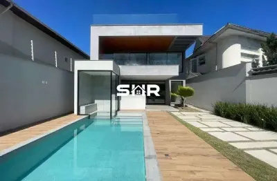 Casa  com 5 suítes, à venda no condomínio interlagos de itaúna na barra da tijuca com segurança