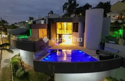 Casa com 5 quartos à venda na rua aldo luz, 121, itaguaçu, florianópolis por r$ 5.500.000