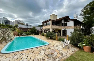 Casa com 4 quartos à venda na travessa josé antônio de lima, 212, itacorubi, florianópolis por r$ 3.600.000