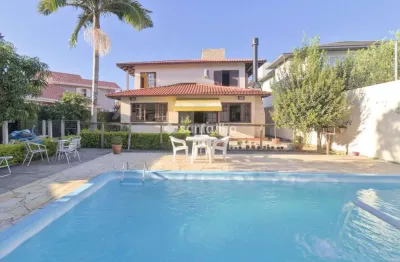 Casa em condomínio fechado com 4 quartos à venda na estrada haroldo soares glavan, 3874, cacupé, florianópolis por r$ 2.968.000